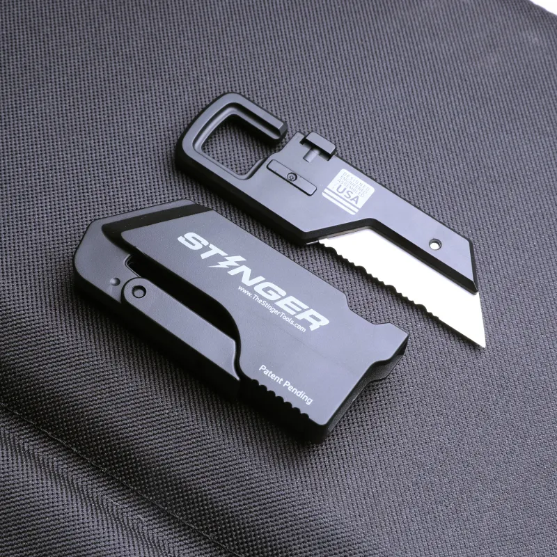 The Stinger Tools ResqBlade Utility Knife showing glass breaker tip, seatbelt cutter, and clip attachment