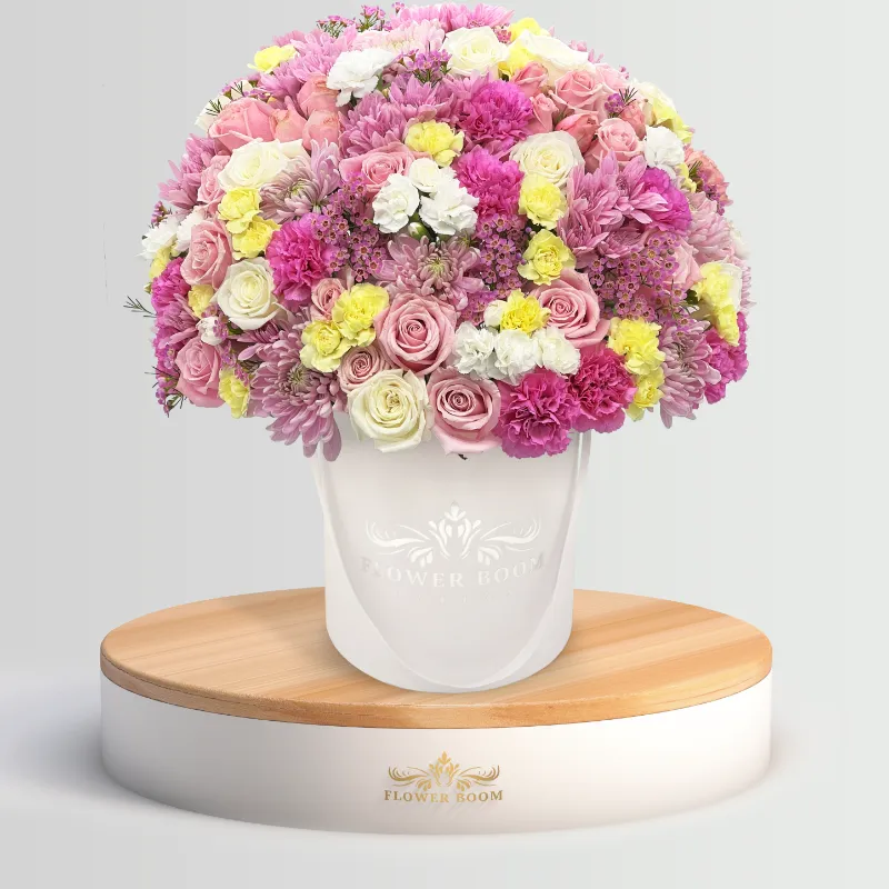 Flower Boom Dallas Pastel Blooms arrangement with soft pastel colored flowers in a vase