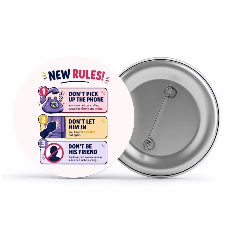 The Banyan Tee US Badge - New Rules 58mm circle pin on white background