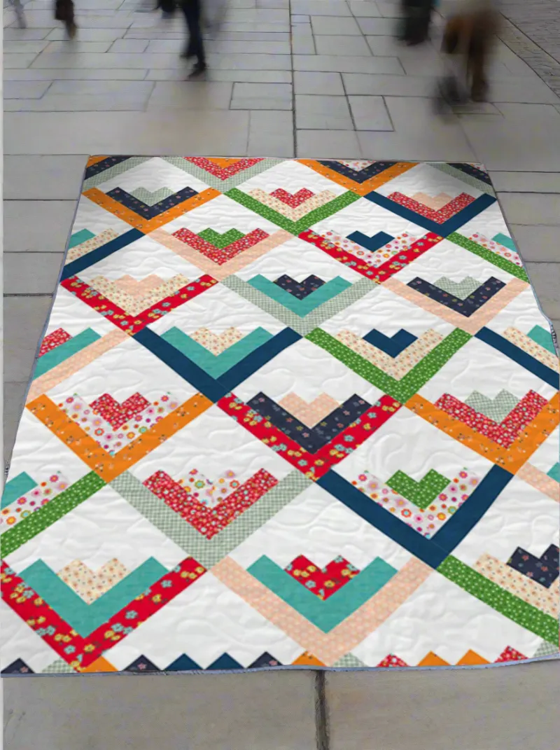 Boho Blanket Hearts in Harmony Quilt Pattern product photo showing the finished quilt
