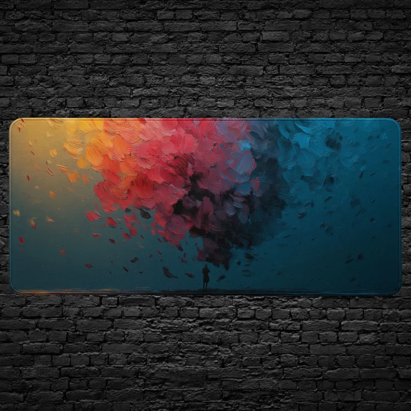 CruArt Abstract Color Explosion Desk Mat featuring bold red, orange, and blue brushstrokes