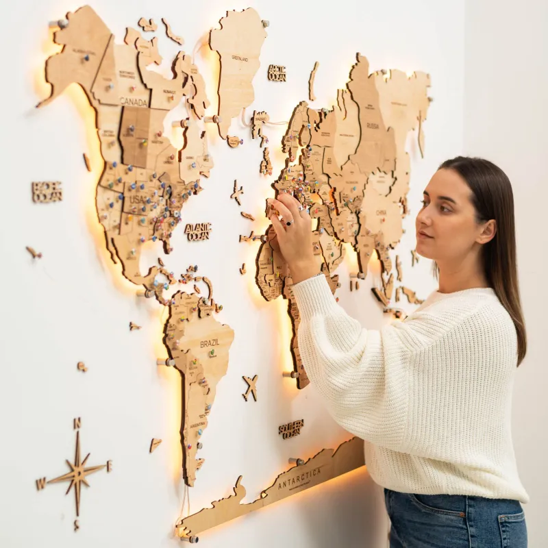 Enjoy The Wood 3D LED Wooden World Map 3.0 Gold with interactive backlight on wall
