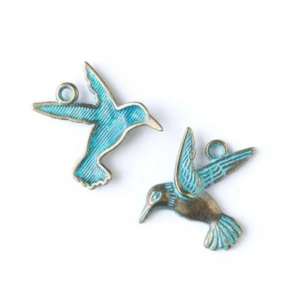 Cherry Tree Beads green bronze hummingbird charm, an antique-finish zinc alloy hummingbird in flight