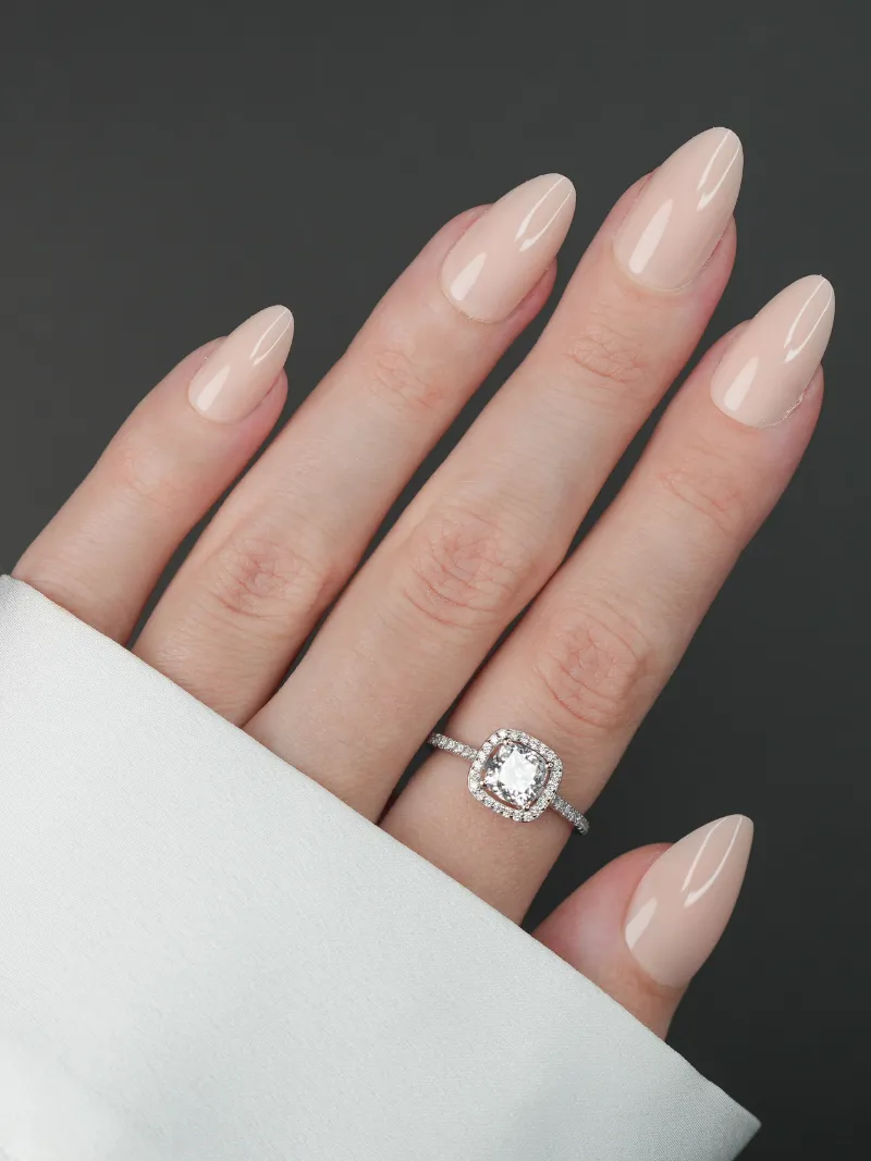 Roxy Nails Paris Creamy beige press-on nails in short almond shape with glossy nude finish