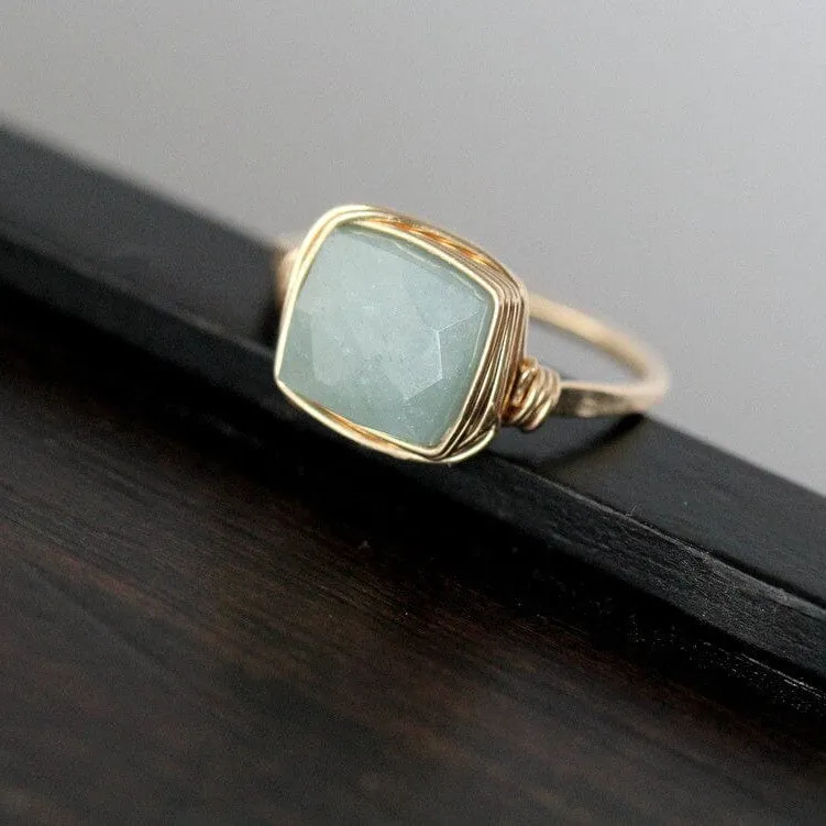 Spirit Nest Aquamarine Cocktail Ring with square-cut blue gemstone in wire-wrapped setting