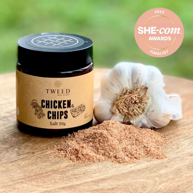 Tweed Real Food Chicken and Chips Salt, a jar of chicken salt next to hot chips