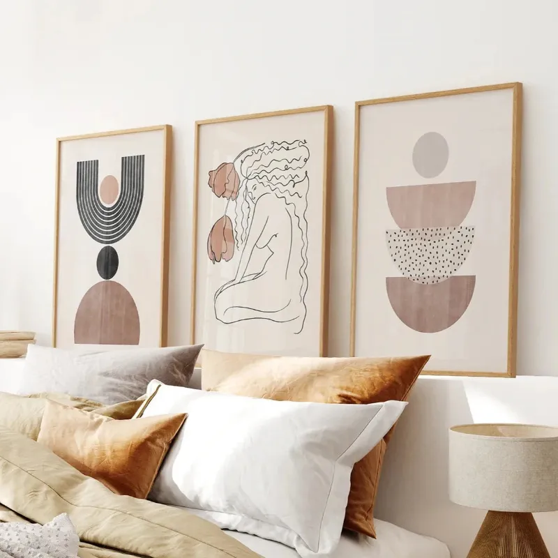 Wall Art Set Boho Abstract Woman Wall Art Set. Neutral Tones showing three abstract woman figure prints in neutral colors