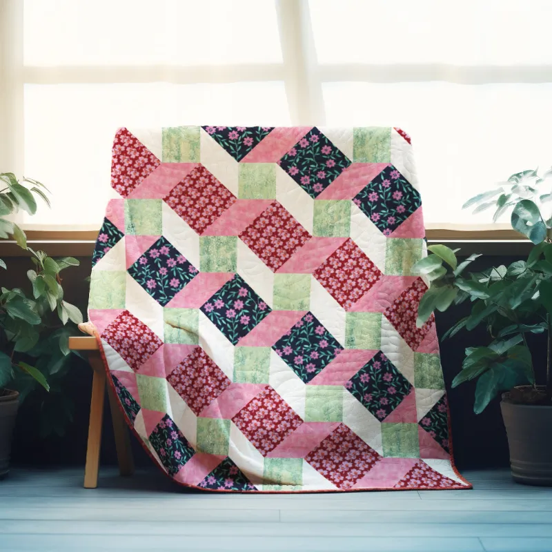 Boho Blanket Elevation Steps Quilt Pattern cover showing a bold graphic quilt in layered prints