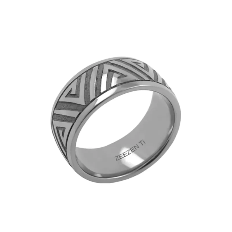 Nammi Celtic Titanium Ring showing hand-carved polished and oxidised Celtic pattern on wide band