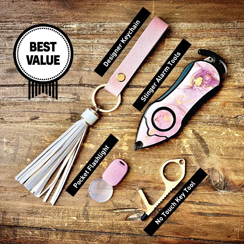 The Stinger Tools Personal Alarm Keychain Set in pink marble, showing alarm siren, seatbelt cutter, glass breaker, and keychain attachment