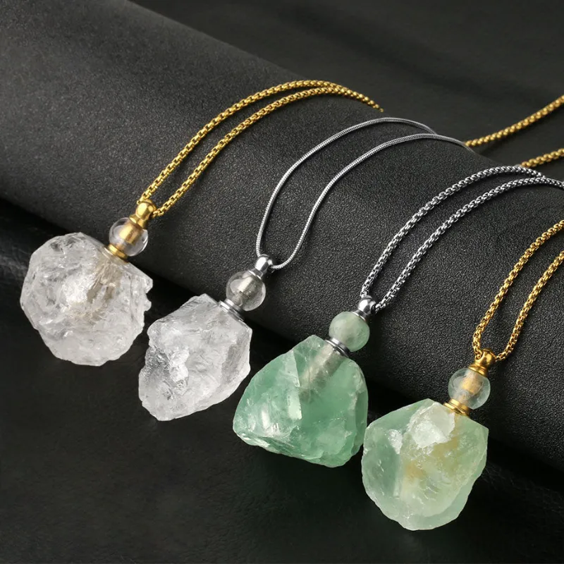Turix Crystal Essential Oil Necklace with Fluorite and Clear Quartz bottle pendant on plated chain