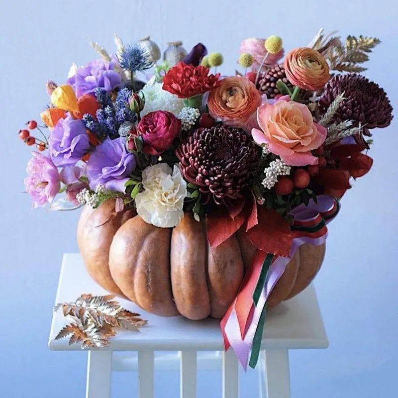 Flower Boom Dallas Fairy pumpkin arrangement with fresh signature flowers in medium pumpkin