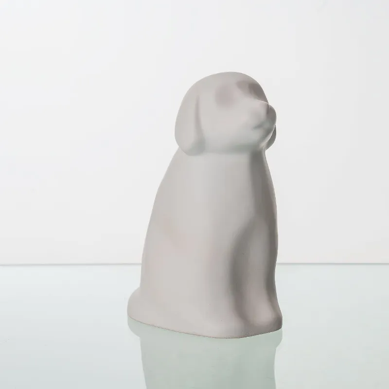 Pulvis Art Urns Cuddle Pet Urn for Dog in white matte ceramic with gold finish and curved design