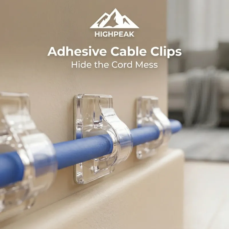 HighPeak Adhesive Cable Clips, clear clips holding cords along a wall and desk edge