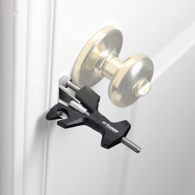 The Stinger Tools Stinger Starship Travel Door Lock shown from front, compact aluminum design