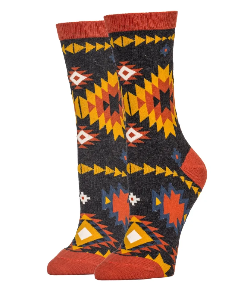 Spirit Nest Chamomile Twist Socks with Southwestern geometric pattern in golden and rust tones