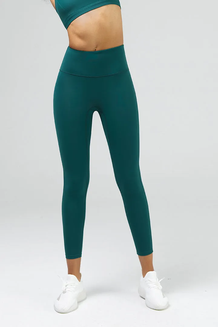 SALTUM 7/8 Workout Legging with Zip Pocket showing back zipper storage detail