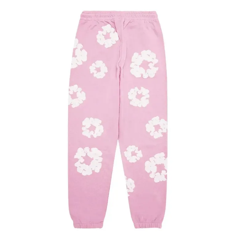 AfewVibe Denim Tears The Cotton Wreath Sweatpants Pink in pink with all-over graphic