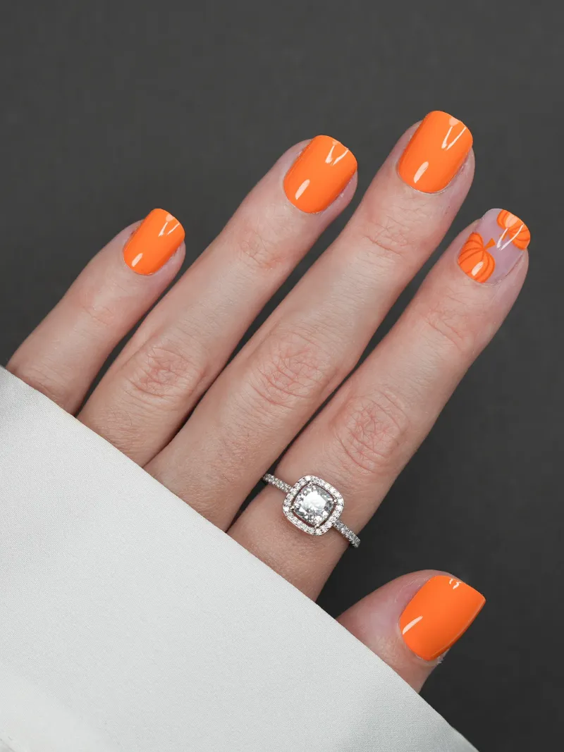 Roxy Nails Paris Pumpkin spice press-on nails in bright orange with pumpkin details