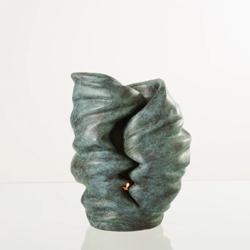 Pulvis Art Urns Cast Bronze Cremation Urn Light in green patina with integrated candle holder