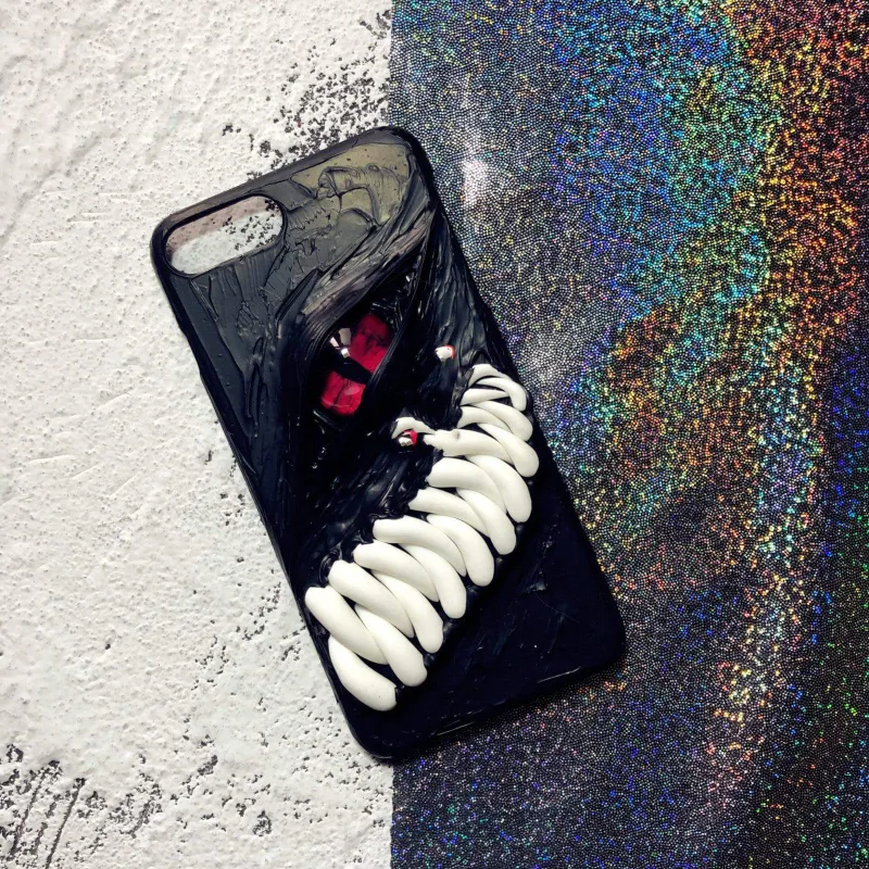 Techypop Monster Teeth Red Eye Handmade Designer iPhone Case showing red-eyed monster teeth design on silicone case
