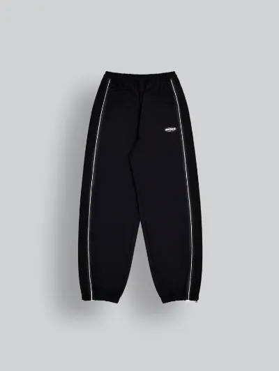 ARNTREAL Eclipse Trackpant in black nylon with reflective details