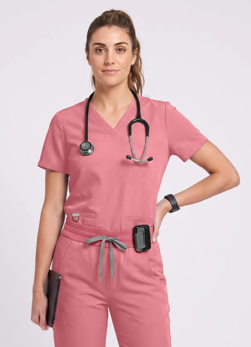 COMENII SoftTouch 3 Pockets Scrub Top in pink with v-neck and pocket details