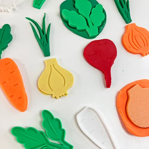 Fun House Toys Rooted Vegetable Cross-Section Stencil Kit showing vegetable-shaped cutters for play dough