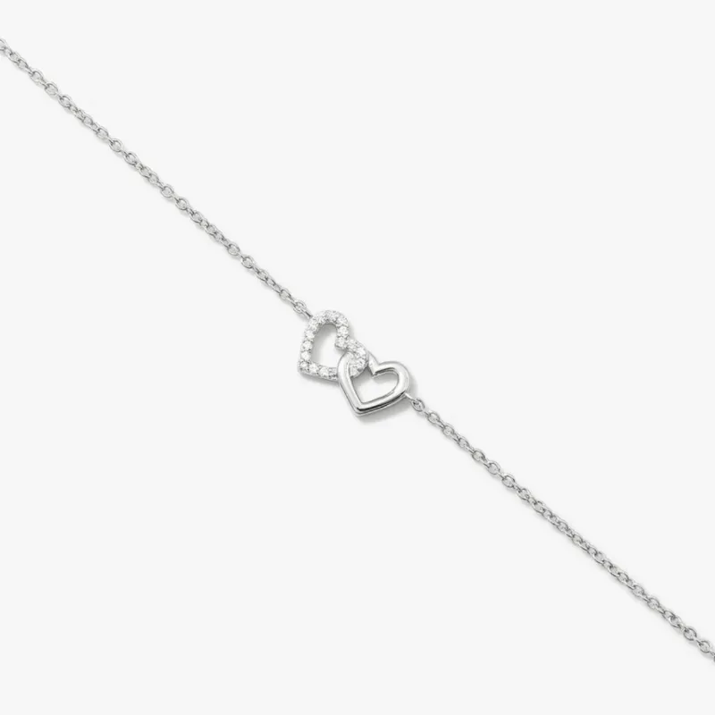 Nimodo Interlocking Ni Modo Heart Bracelet showing two connected heart charms with crystal detail