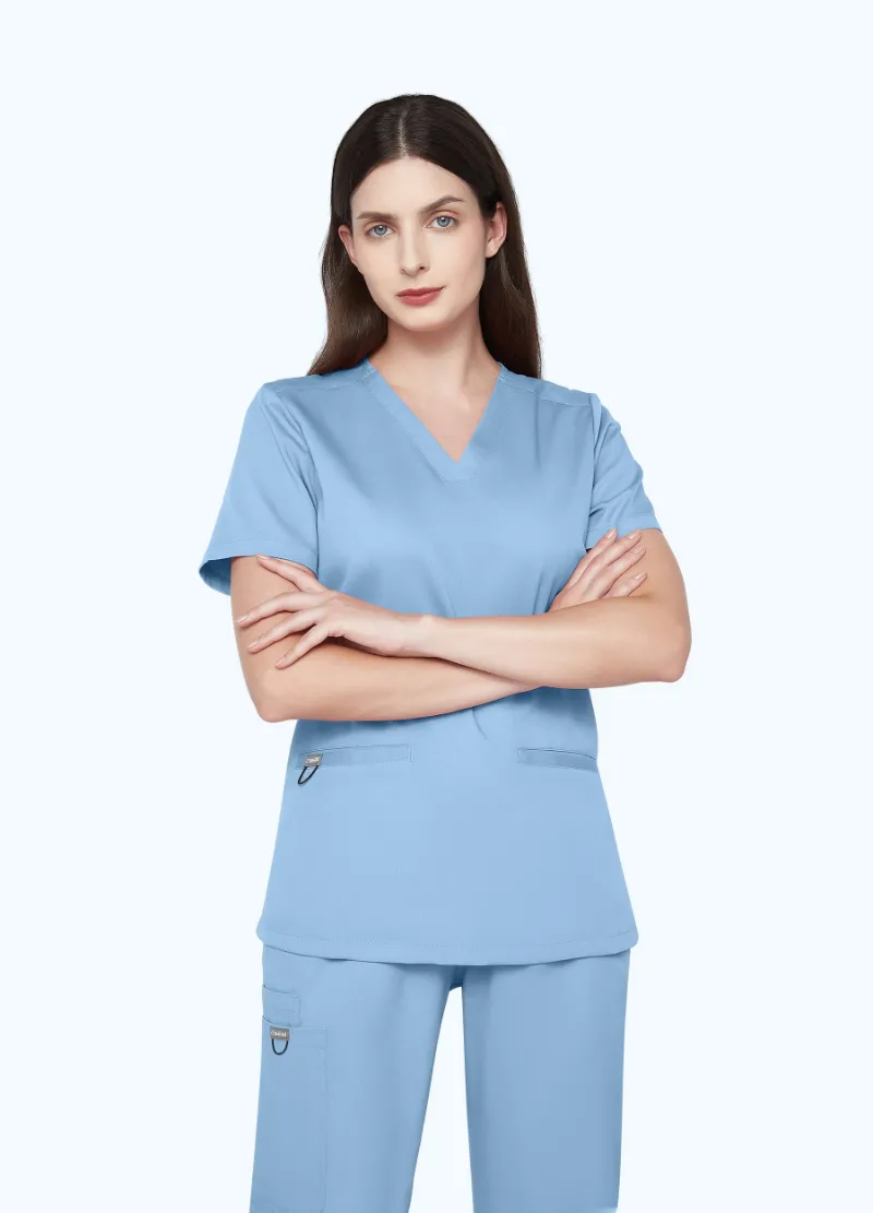 COMENII SoftTouch Essential Scrub Top in Ceil Blue, front view