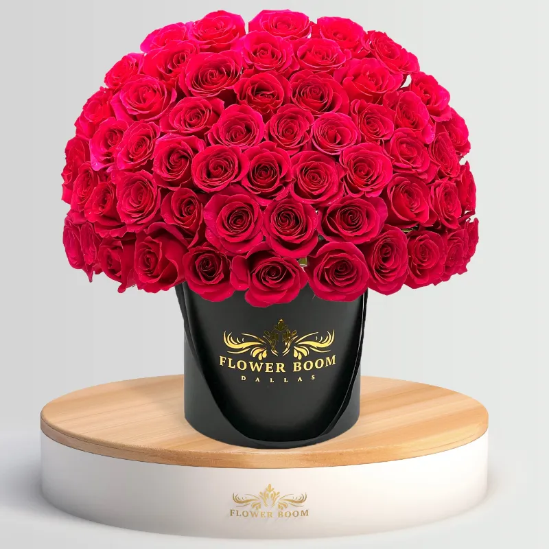 Flower Boom Dallas Fuchsia Roses in a Box showing bright hot pink roses arranged in a luxury black box