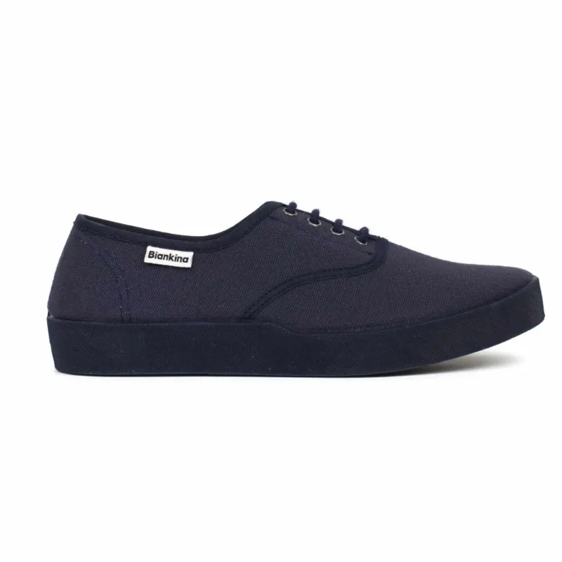 BIANKINA Capri Organic Cotton Canvas Plimsoll Sneakers in Navy Blue, side view of slip-on sneaker
