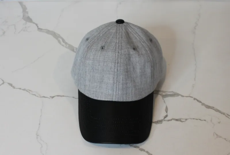 Embellished Heather Grey Cap with black faux leather brim and purple satin lining