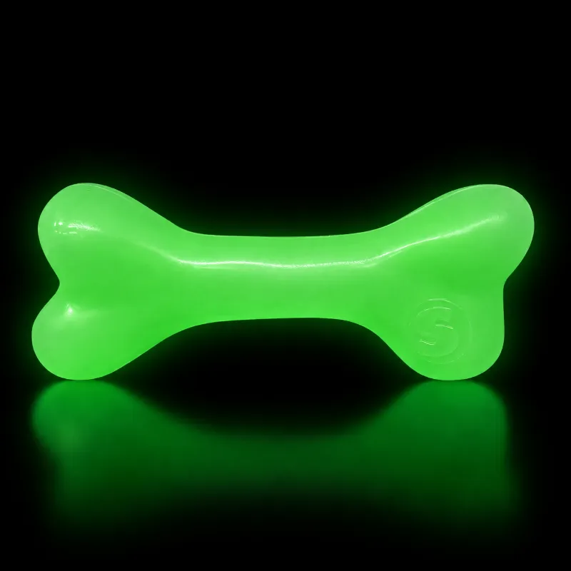 Soda Pup PUP-X Rubber Glow in the Dark Chew Bone Dog Toy - glow effect on a dark background