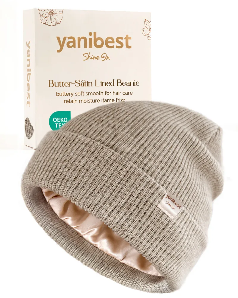 Yanibest Butter Satin Lined Knit Skull Beanie in Heather Oat shown on model