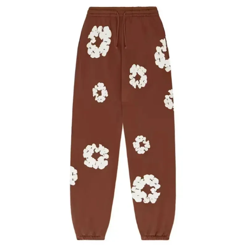 AfewVibe Denim Tears The Cotton Wreath Sweatpants Brown, brown cotton sweatpant with white puff-printed wreath motif flat lay