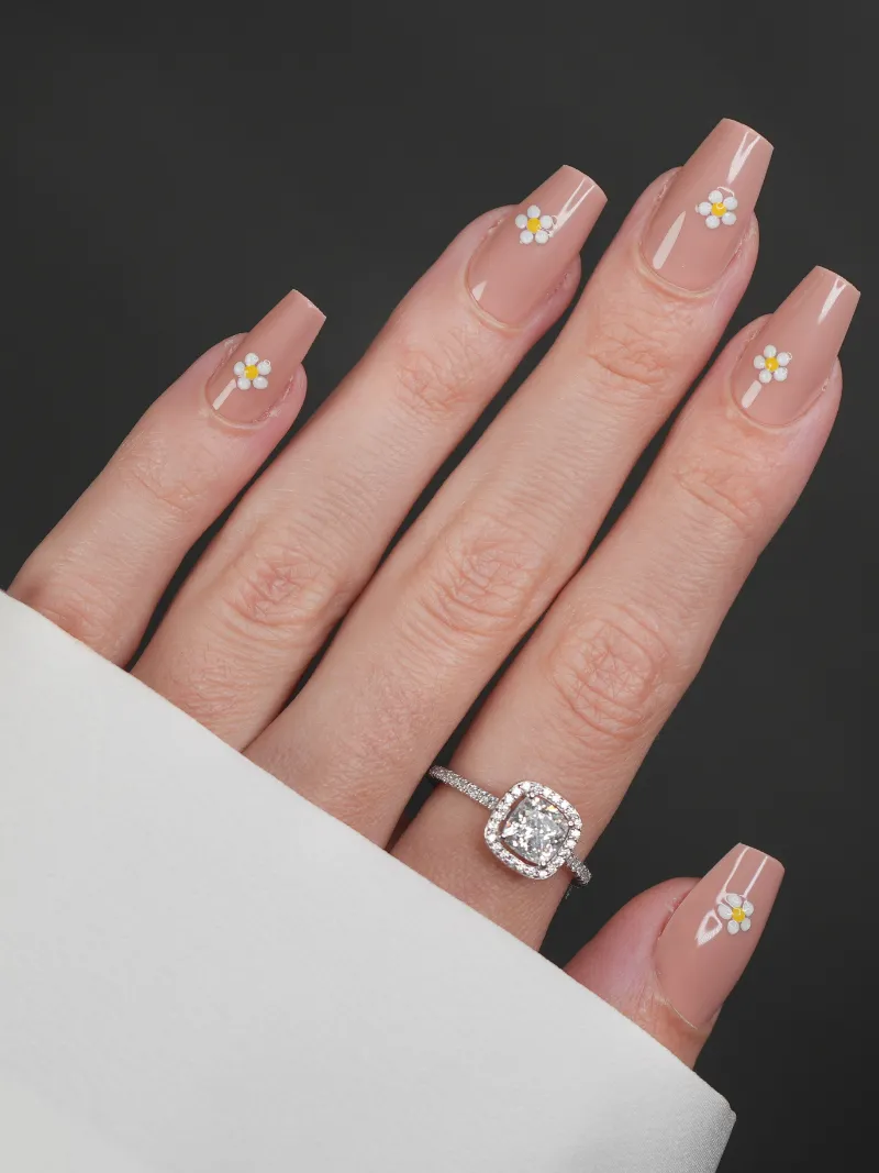 Roxy Nails Paris Daisy press-on nails with 3D daisy flowers on apricot nude base