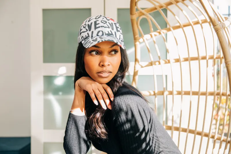 Embellished LOVE Cap in white with black LOVE lettering and pink heart design