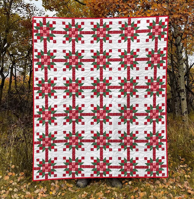 Boho Blanket Festive Crossroads Quilt Pattern showing a bold tree-ring quilt design in layered colors