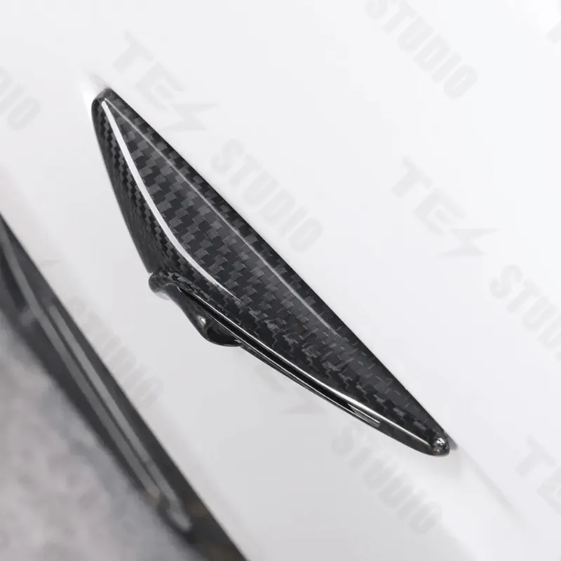 Tesstudio Carbon Fiber Leaf Camera Full Coverage Sticker Kit for Tesla Model Y L showing woven carbon fiber texture on camera housing